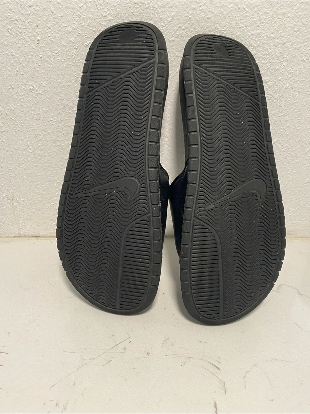 Nike Black Slide Sandals with White Swoosh Logo - Kids